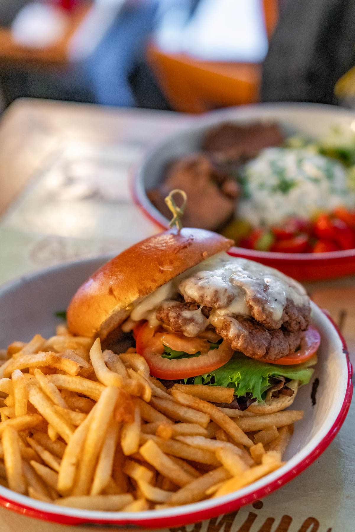 Cheeseburger and fries from The Grey Dog